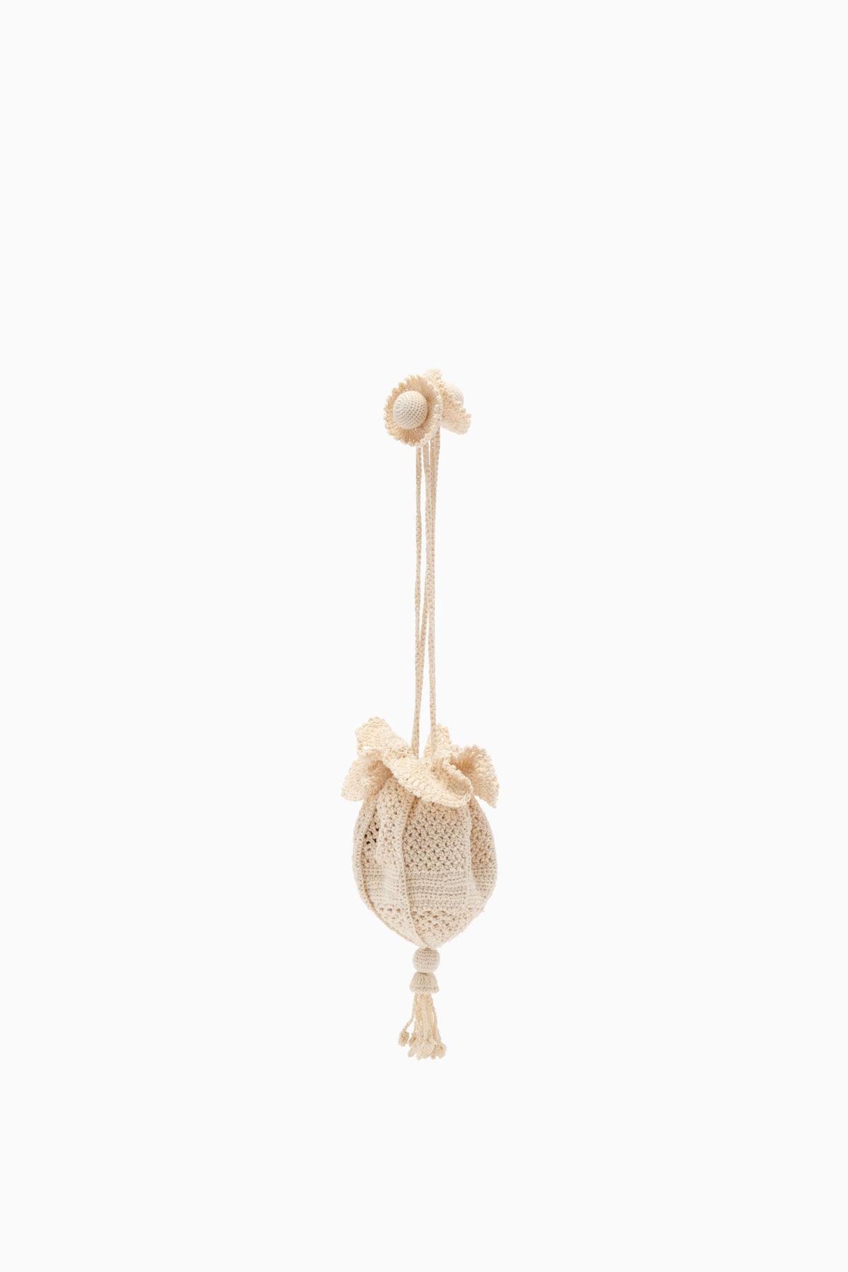 Sac sirène en crochet fait main naturel avec cordon de serrage et détail floral - Vue latérale | Ulla Johnson