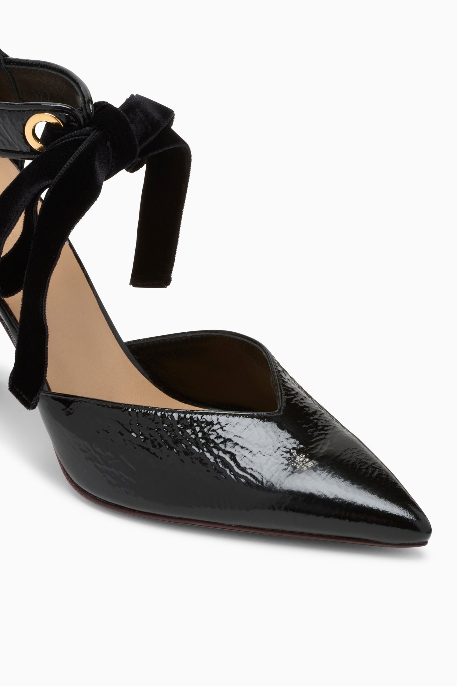 Noir Patent Leather Eyelet Heel Velvet Bow & Brass Eyelet Detail - Close-Up | Ulla Johnson