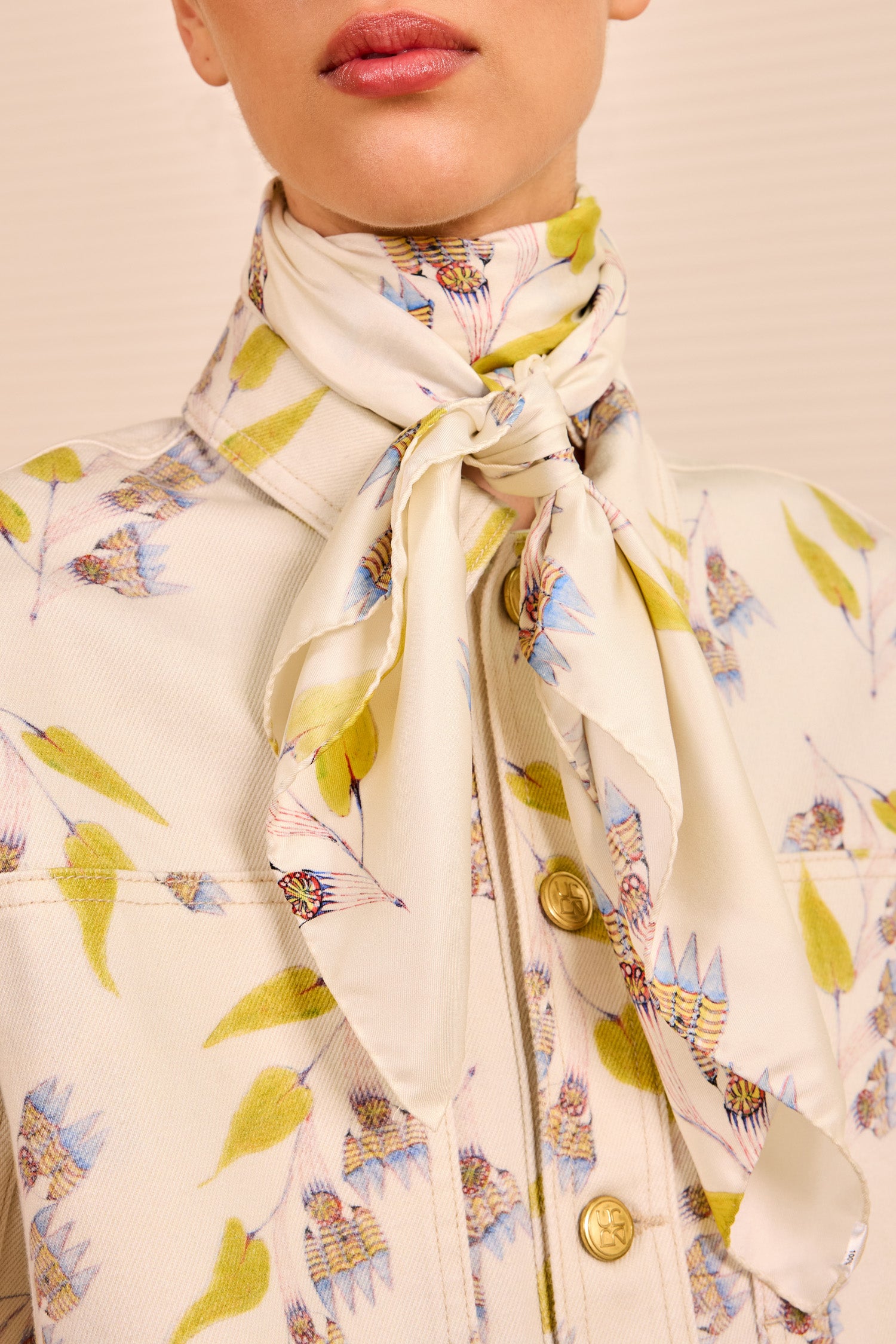Ulla Johnson Ivory Silk Chiara Scarf in Infinite Flower Print, Tied at Neck On Model | Ulla Johnson