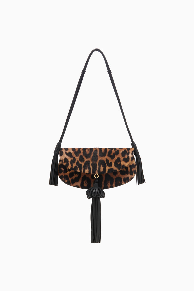 Leopard Calf Hair Flap Crossbody Bag with Black Leather Tassels - Front View | Ulla Johnson