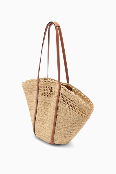 Natural Designer Raffia Basket Tote with Tan Leather Trim - Three-Quarter View | Ulla Johnson