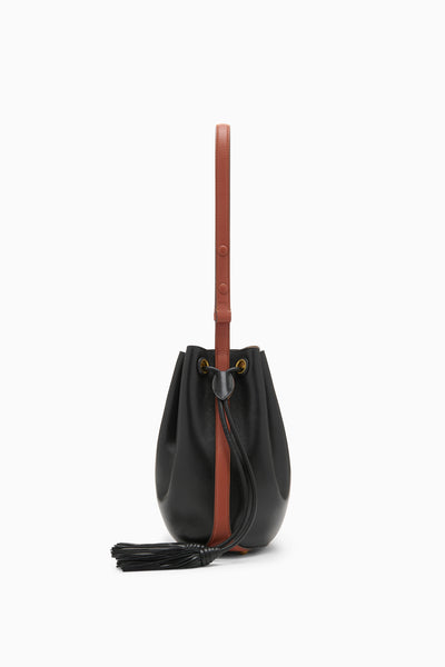 Black Nappa Leather Bucket Bag with Tan Strap, Side View - Drew Bag | Ulla Johnson